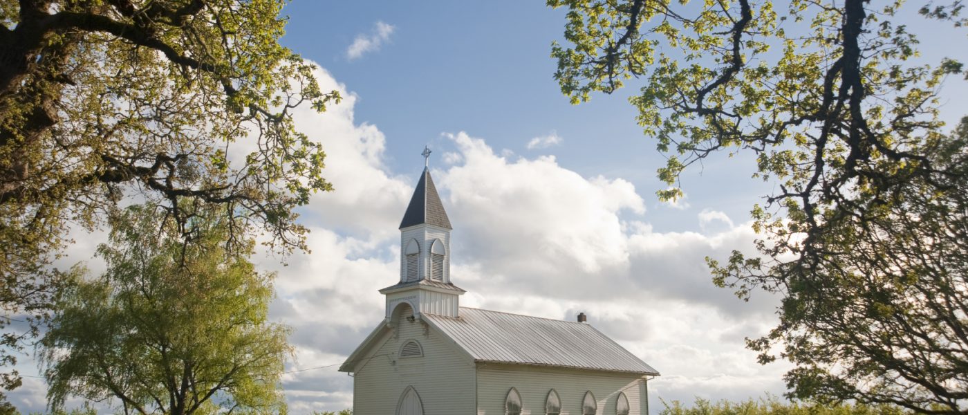 Old clapboard white rural church in Willamette Valley, Oregon, Oak Grove